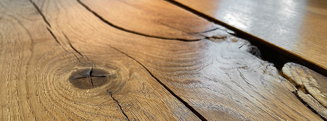 Ueber-uns-Header-Holzstruktur